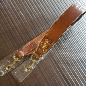 Dooney & Bourke Tan Leather Strap with Gold Hardware